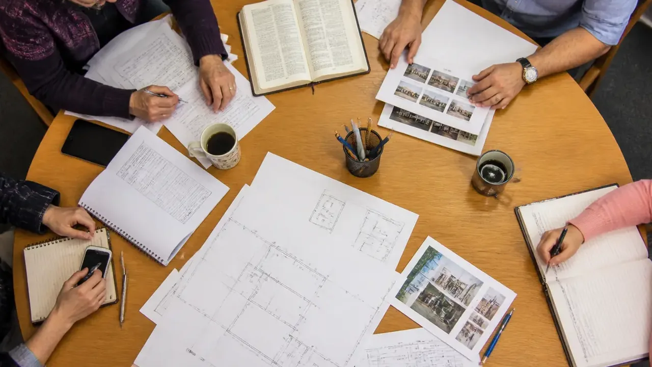 Overhead view of raffle tickets and a cash box on a table
