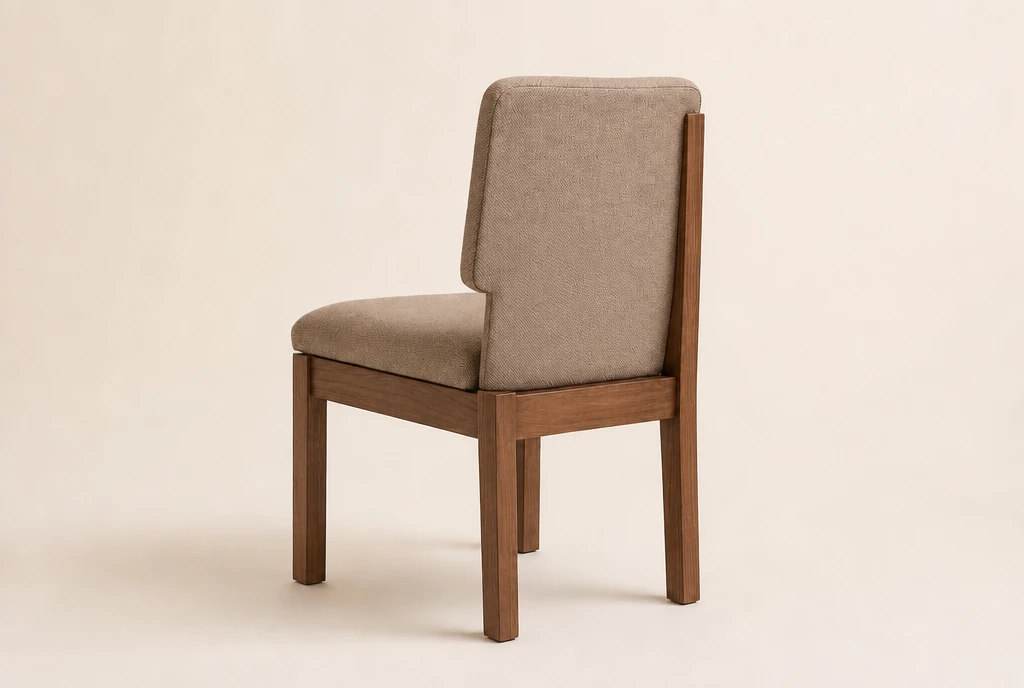 Warm medium-walnut hardwood church chair concept with muted warm taupe woven fabric and no rear book rack